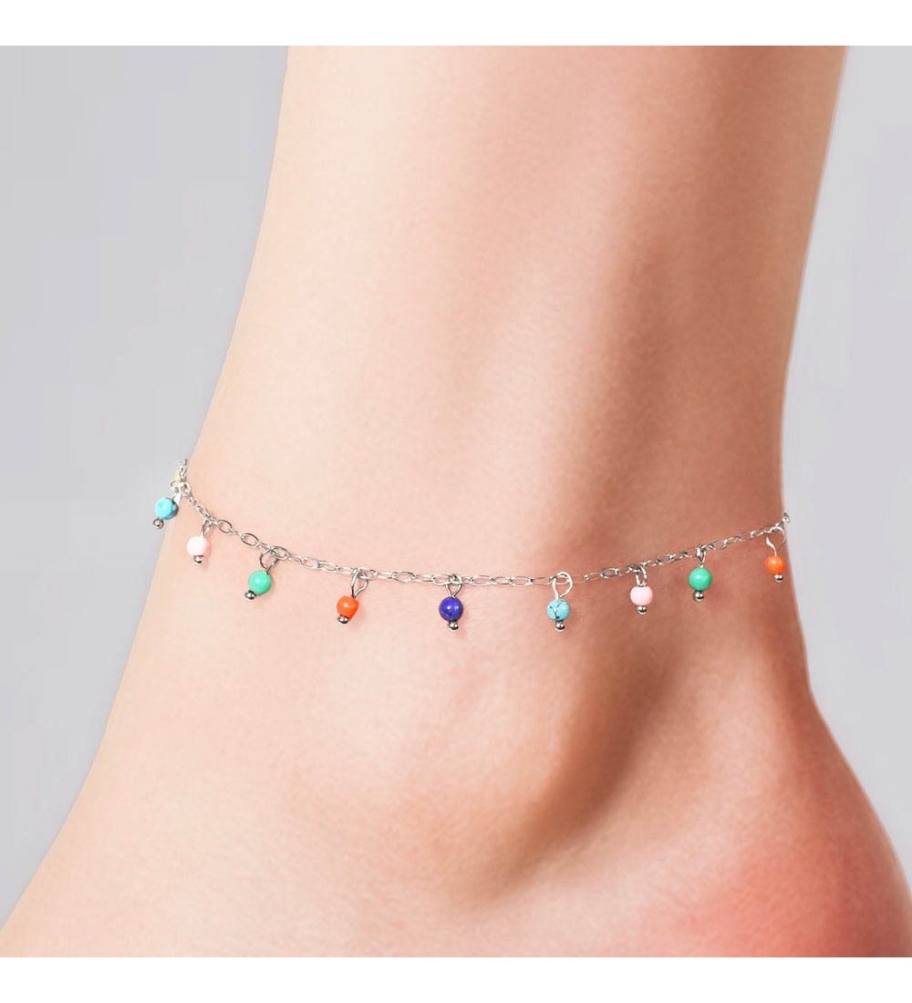 Tobillera de acero inoxidable con piedras de colores y diseño fresco ideal para verano.