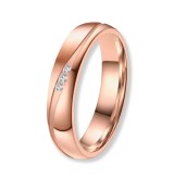 Anell d’aliança per dona en titani IP rosa 14k amb zirconites incrustades, acabat brillant i disseny modern