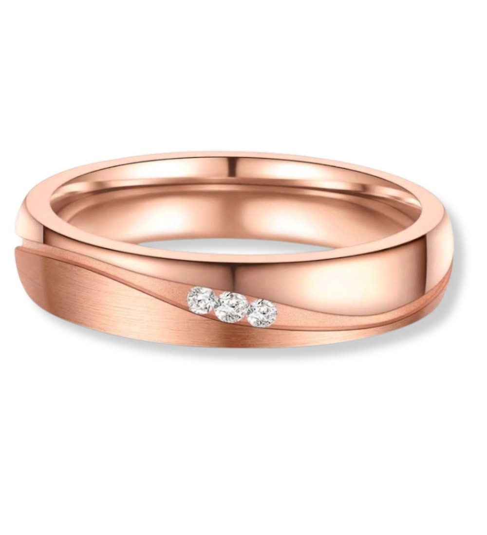 Anell d’aliança per dona en titani IP rosa 14k amb zirconites incrustades, acabat brillant i disseny modern