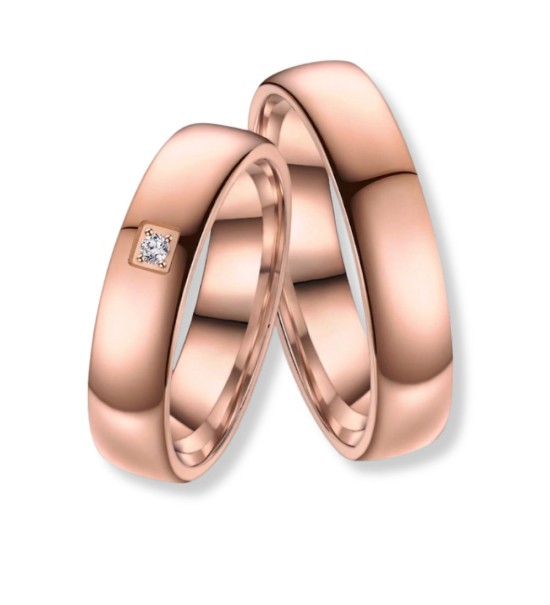 Anell d’aliança per dona de titani rosa amb zirconita incrustada disseny elegant i minimalista