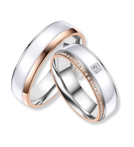 Anell d’aliança de casament en acer bicolor amb acabat en to rosa 14k, disseny modern i elegant.