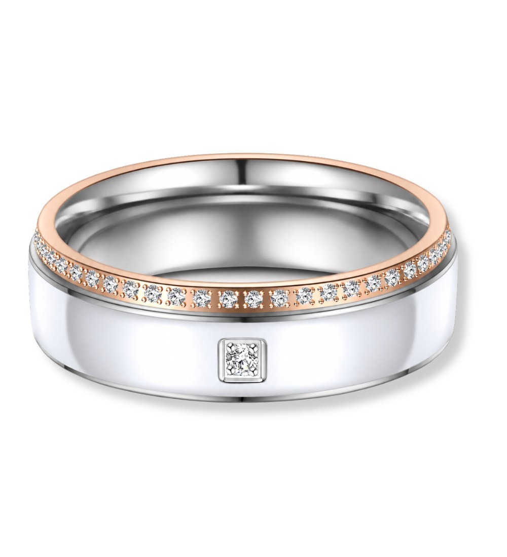 Anillo de alianza bicolor en acero con detalle en tono rosa 14k y circonitas brillantes