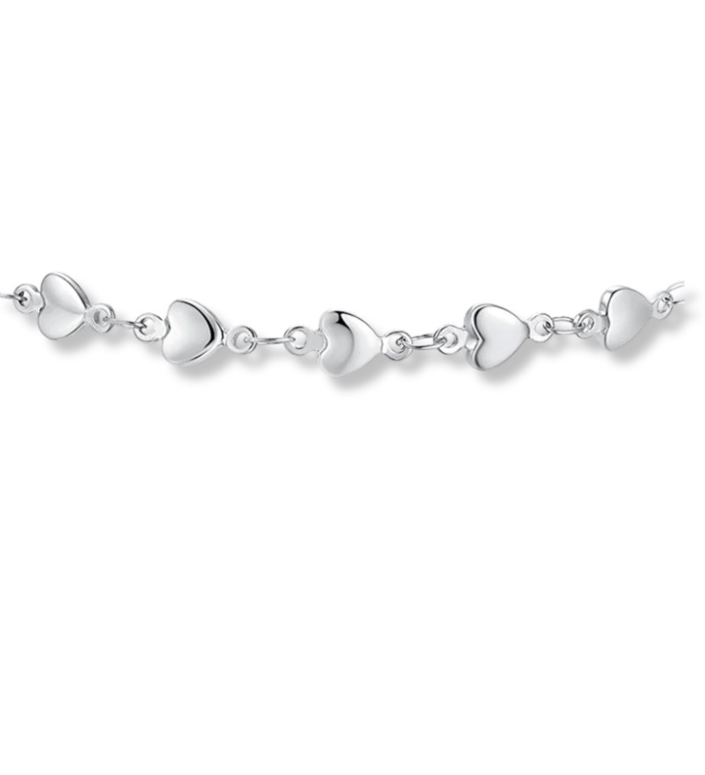 Tobillera de acero inoxidable con pequeños corazones brillantes, un complemento femenino y elegante para cualquier ocasión.